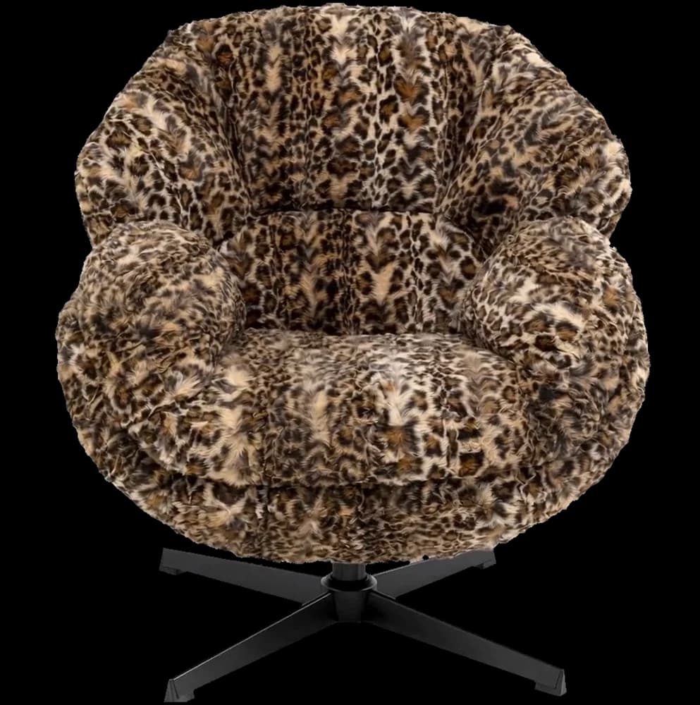 A single iconic KARE lounge chair, rotating slowly against a dark gallery backdrop.