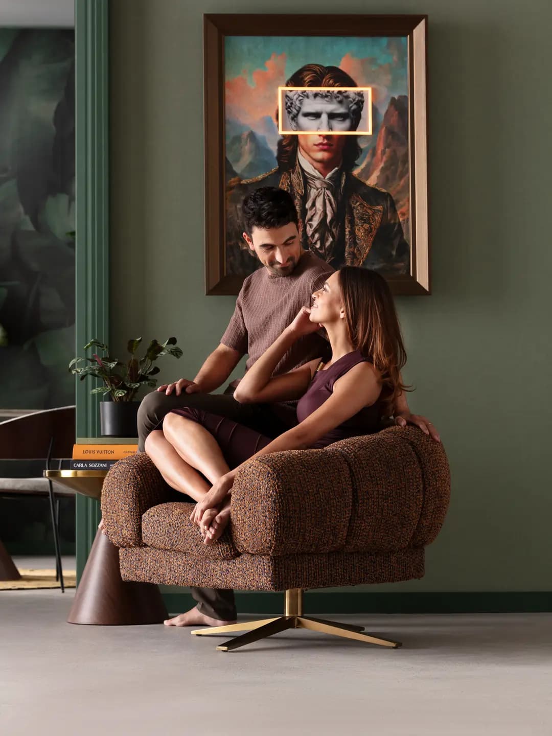 An editorial deep-green room with a sculptural lounge chair.